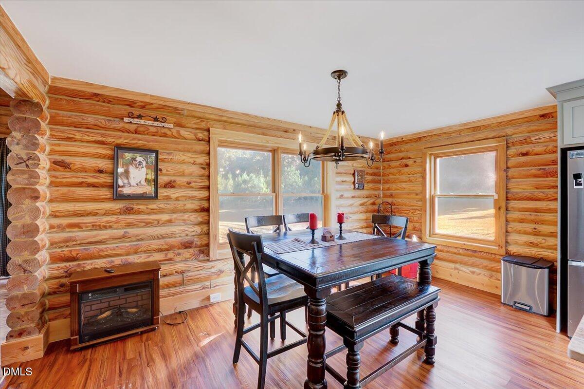 8545 Grassy Creek Road Oxford, NC 27565 - Photo 11 of 39 a view of a workspace with furniture and window