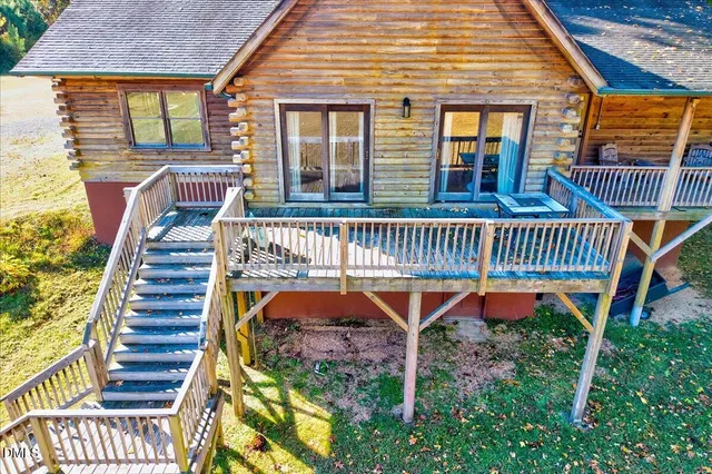 a view of house with outdoor entertaining spaces