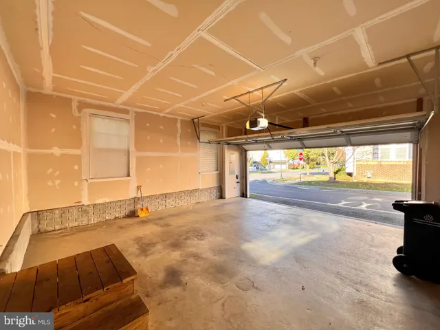a view of a empty room with a gym equipment