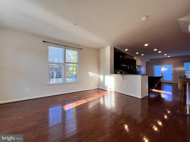 a view of kitchen with a sink and a window