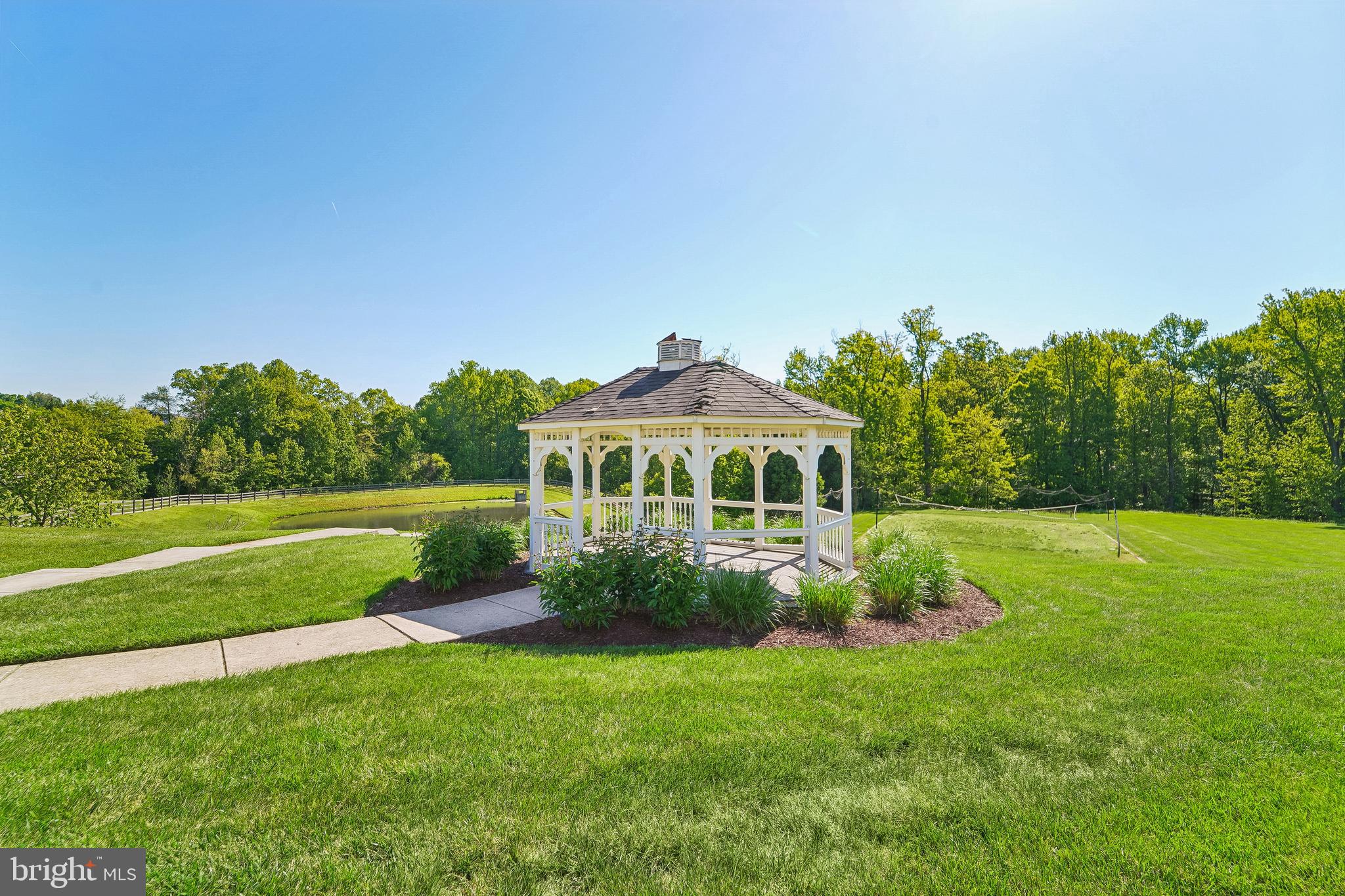 1461 Pangbourne Way Hanover, MD 21076 - Photo 50 of 51 a front view of a house with garden
