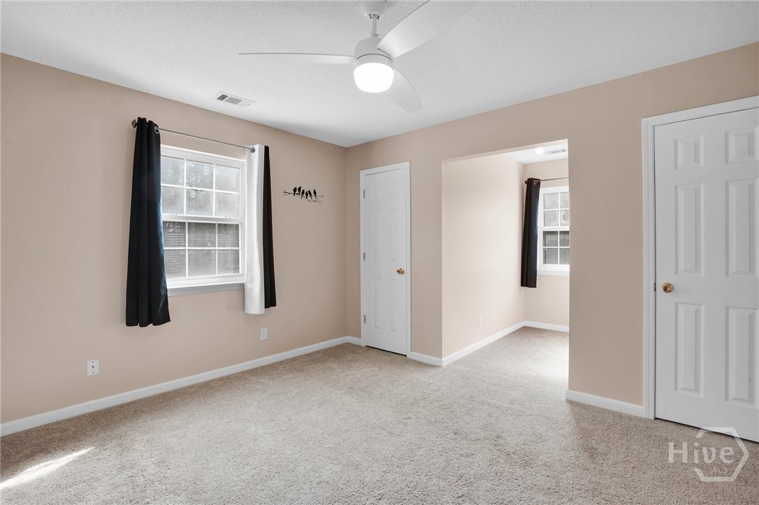 548 Sand Hill Road Brooklet, GA 30415 - Photo 26 of 44 Guest Bedroom with Dual Closets