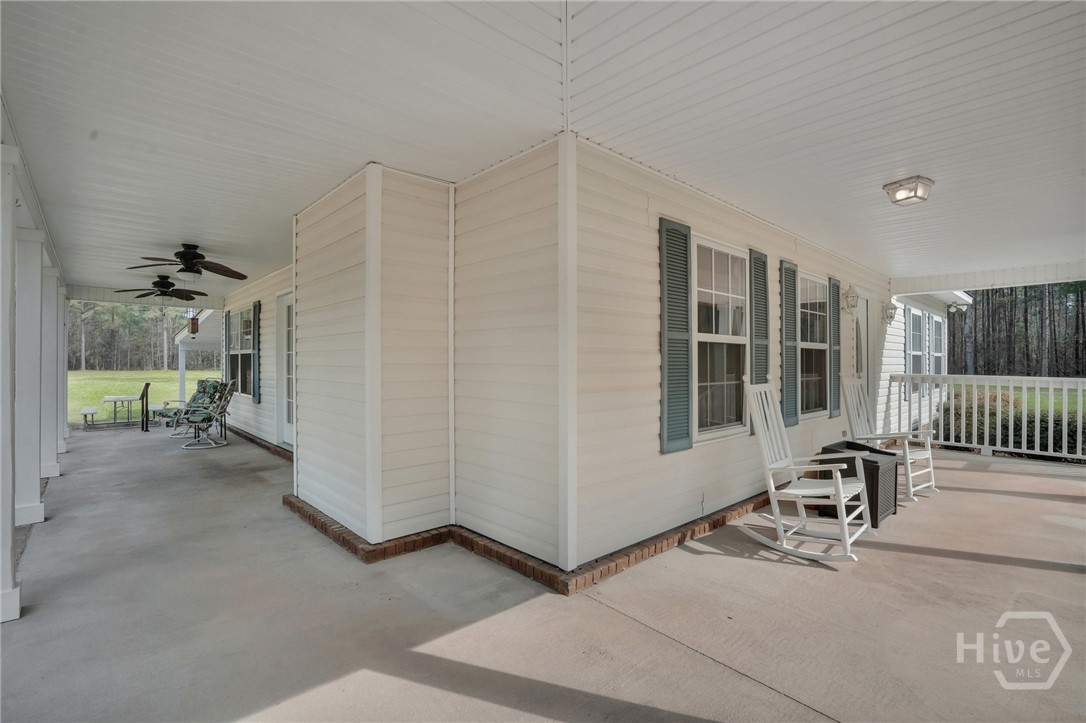 548 Sand Hill Road Brooklet, GA 30415 - Photo 33 of 44 Wrap Around Porch