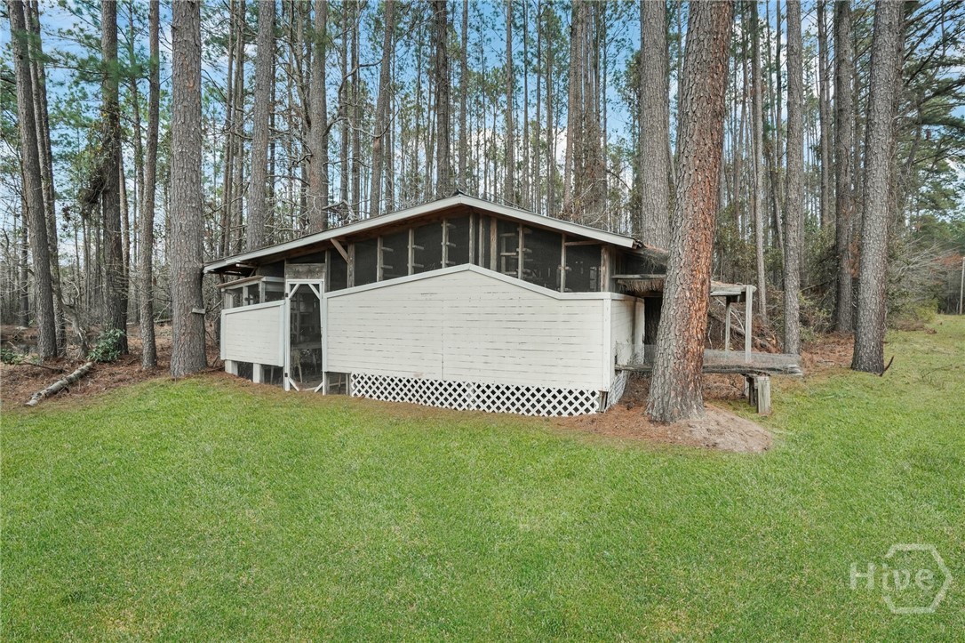 548 Sand Hill Road Brooklet, GA 30415 - Photo 37 of 44 Pigeon Pins (houses approximately 500 birds)