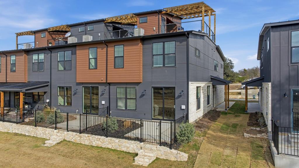 138 Clark Stephenville, TX 76401 - Photo 28 of 32 a front view of a house with a glass door
