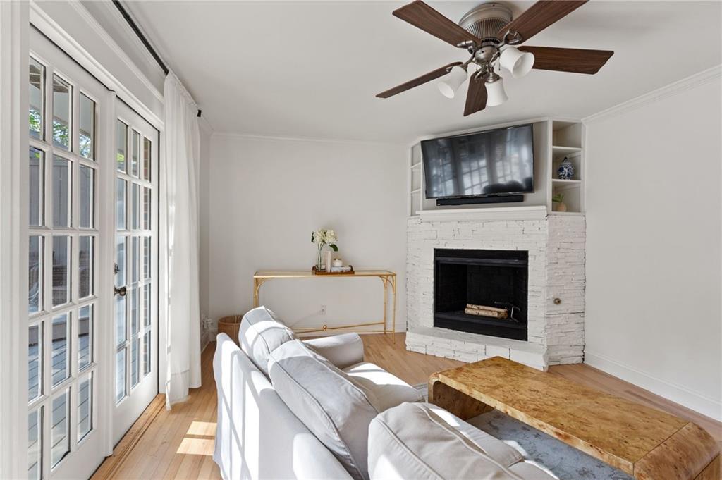 3371 King Springs Road Southeast Smyrna, GA 30080 - Photo 17 of 48 a living room with furniture and a fireplace