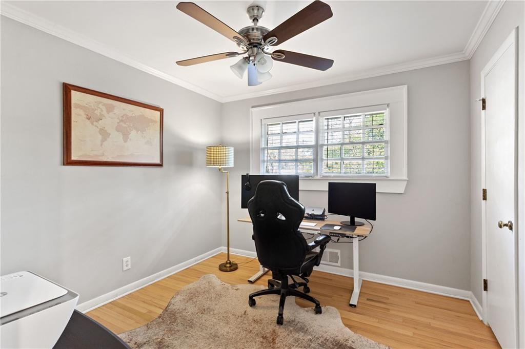 3371 King Springs Road Southeast Smyrna, GA 30080 - Photo 18 of 48 a view of a workspace with furniture and a window