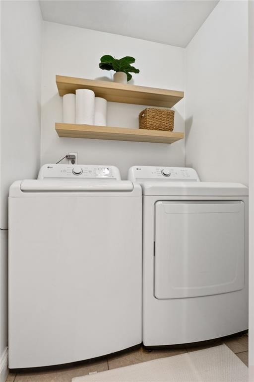3371 King Springs Road Southeast Smyrna, GA 30080 - Photo 21 of 48 a utility room with dryer and washer