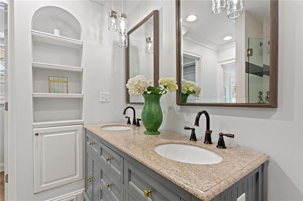 3371 King Springs Road Southeast Smyrna, GA 30080 - Photo 26 of 48 a bathroom with a granite countertop sink and a mirror
