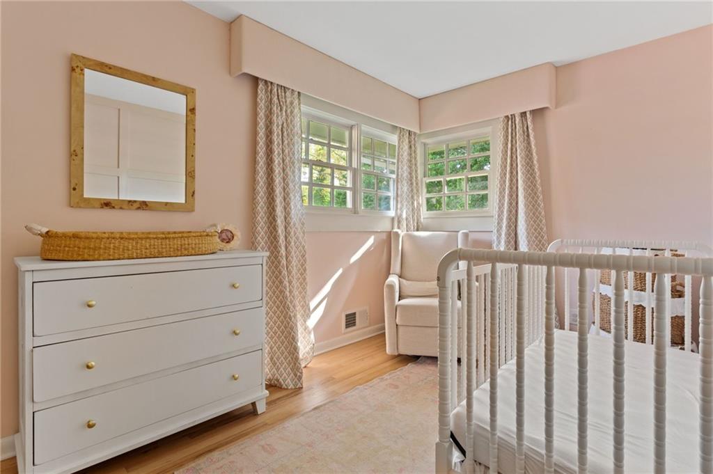 3371 King Springs Road Southeast Smyrna, GA 30080 - Photo 29 of 48 a view of a bedroom with furniture and windows