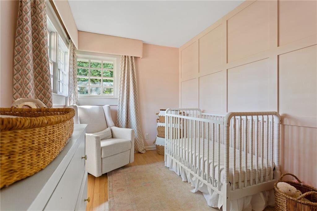 3371 King Springs Road Southeast Smyrna, GA 30080 - Photo 30 of 48 a bedroom with furniture and a large window