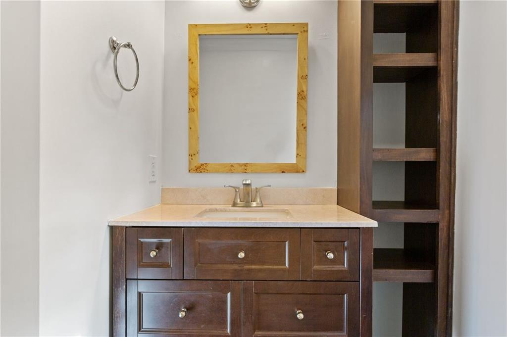 3371 King Springs Road Southeast Smyrna, GA 30080 - Photo 33 of 48 a bathroom with a sink and a mirror