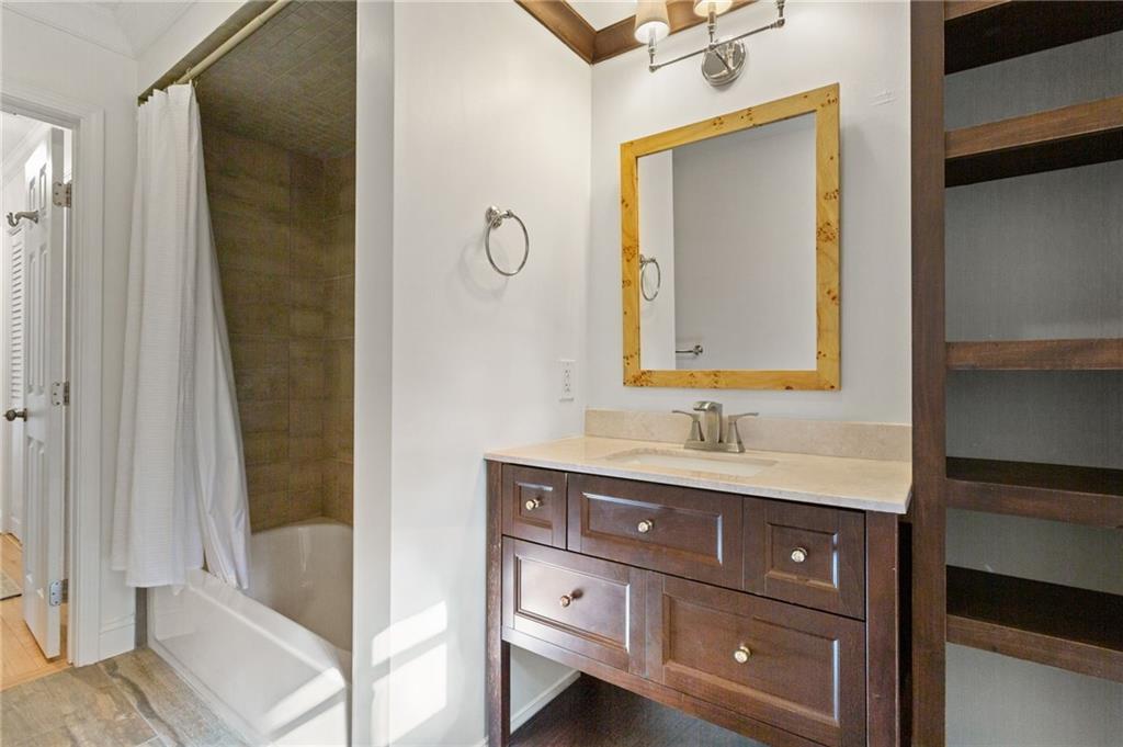 3371 King Springs Road Southeast Smyrna, GA 30080 - Photo 34 of 48 a bathroom with a sink vanity and mirror
