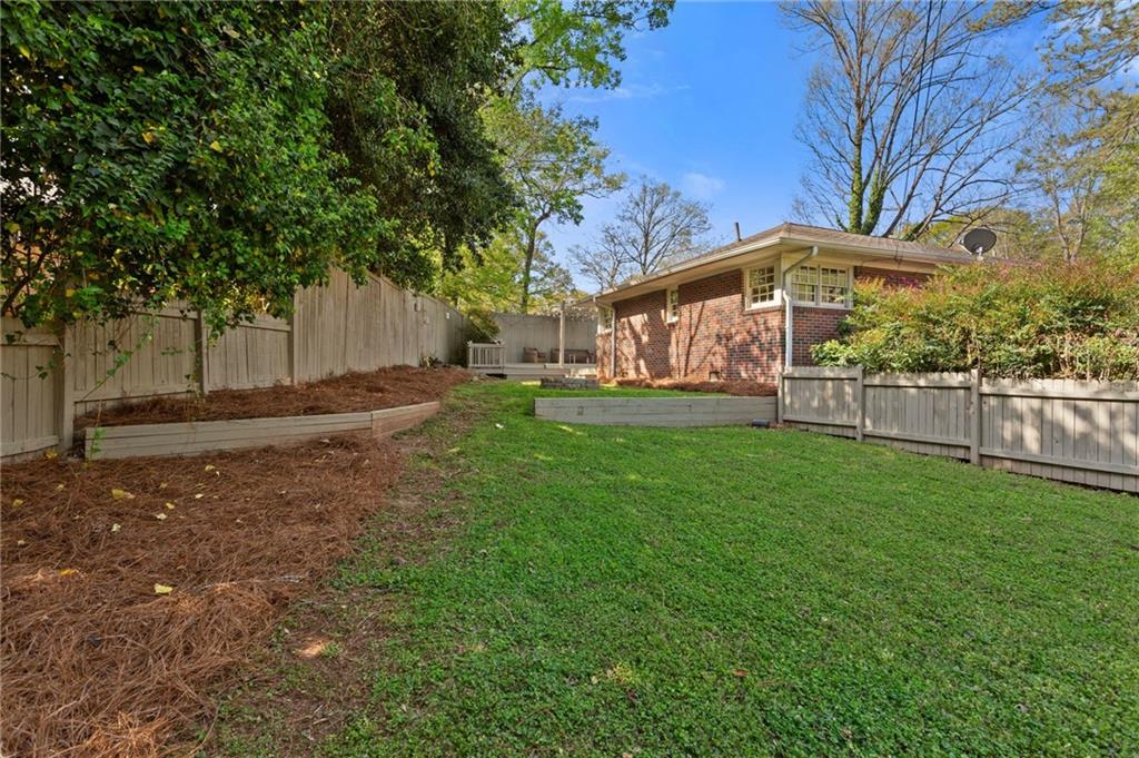 3371 King Springs Road Southeast Smyrna, GA 30080 - Photo 39 of 48 a front view of a house with a yard