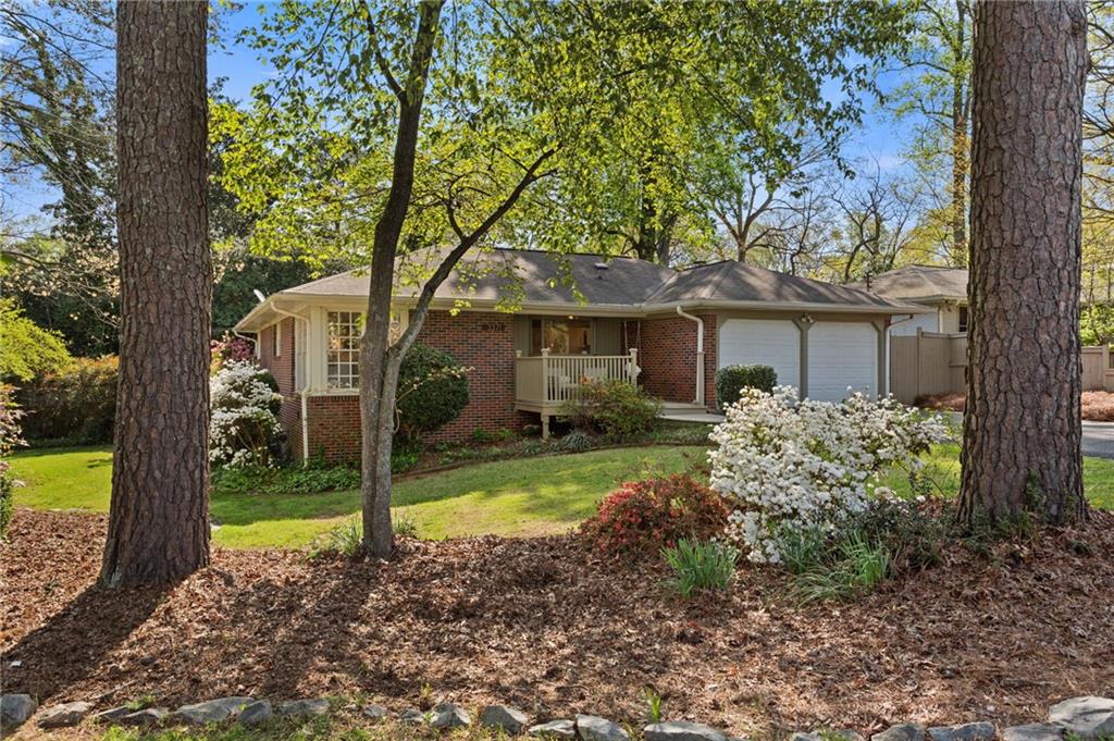 3371 King Springs Road Southeast Smyrna, GA 30080 - Photo 43 of 48 a view of a house with backyard and a tree