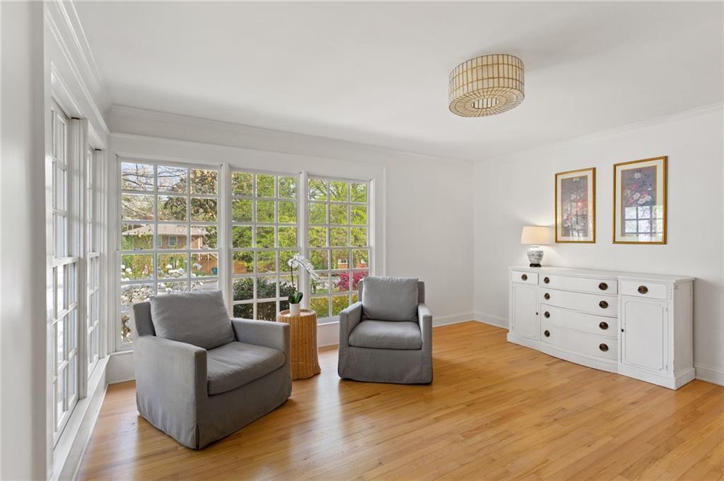 3371 King Springs Road Southeast Smyrna, GA 30080 - Photo 9 of 48 a living room with furniture and a large window