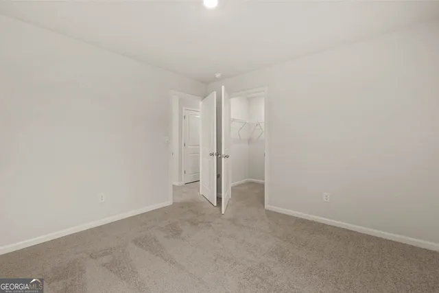 a bathroom with a sink a mirror and a shower