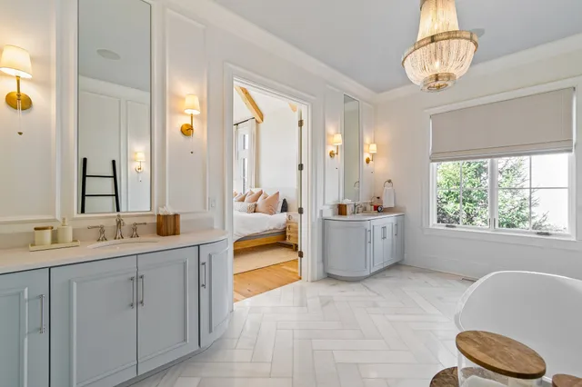 a bathroom with a tub and shower