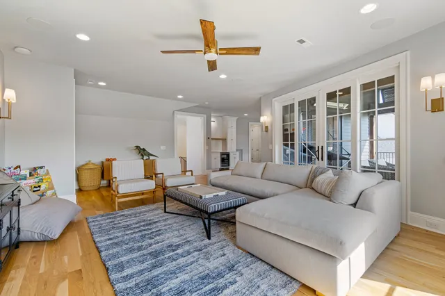 a kitchen that has a sink and a stove in it