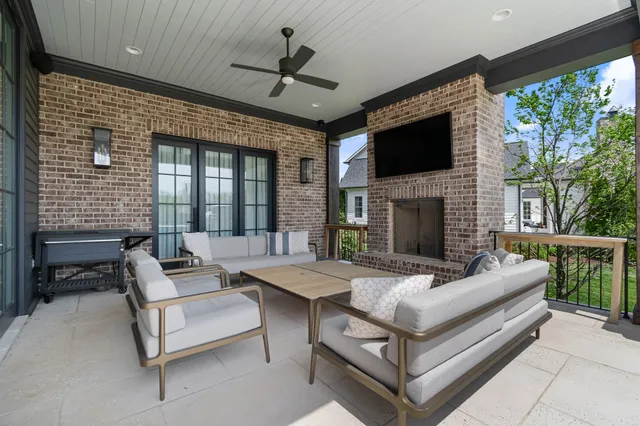 a view of balcony with furniture and city view