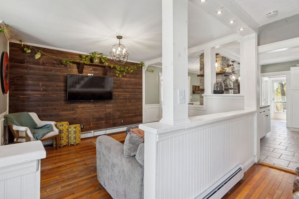 46 Appleton Street Saugus, MA 01906 - Photo 15 of 42 a living room with furniture and a flat screen tv