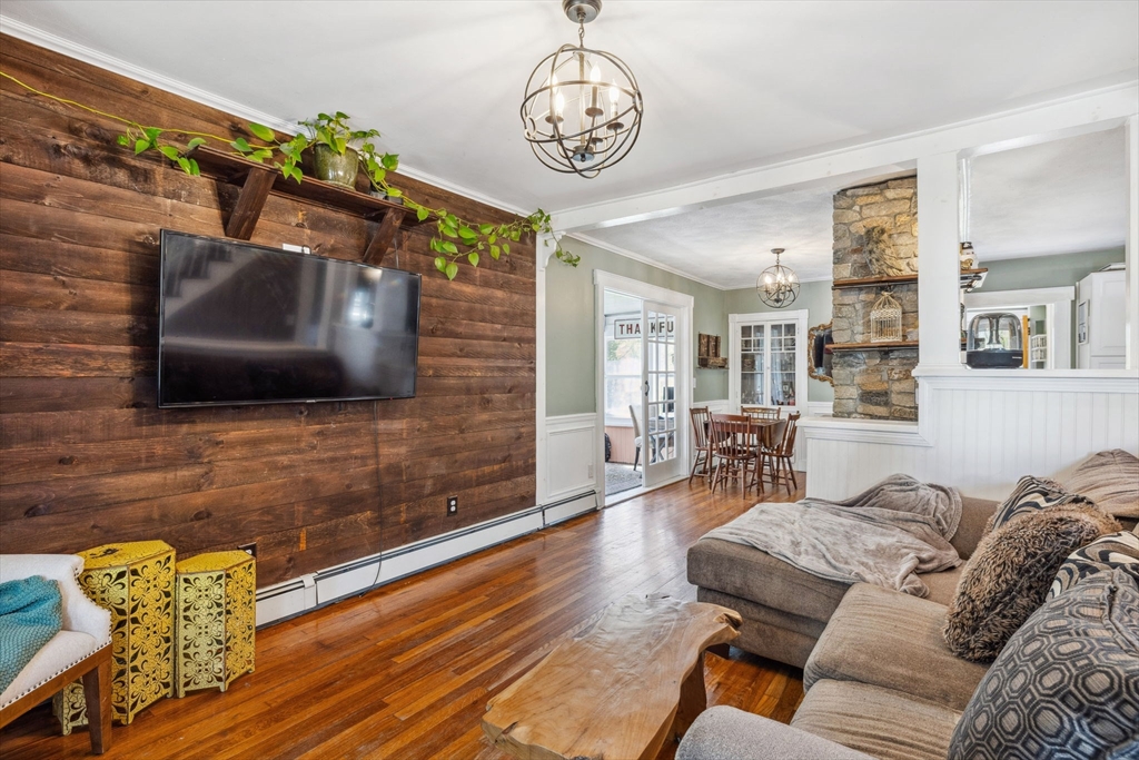 46 Appleton Street Saugus, MA 01906 - Photo 17 of 42 a living room with furniture and a flat screen tv