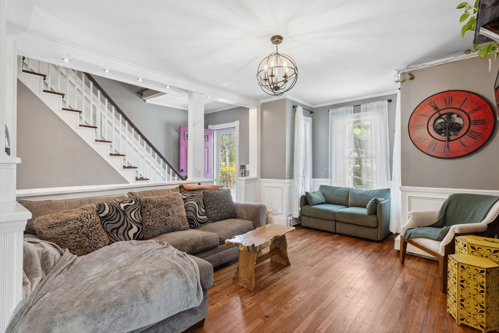 46 Appleton Street Saugus, MA 01906 - Photo 19 of 42 a living room with furniture and a wooden floor