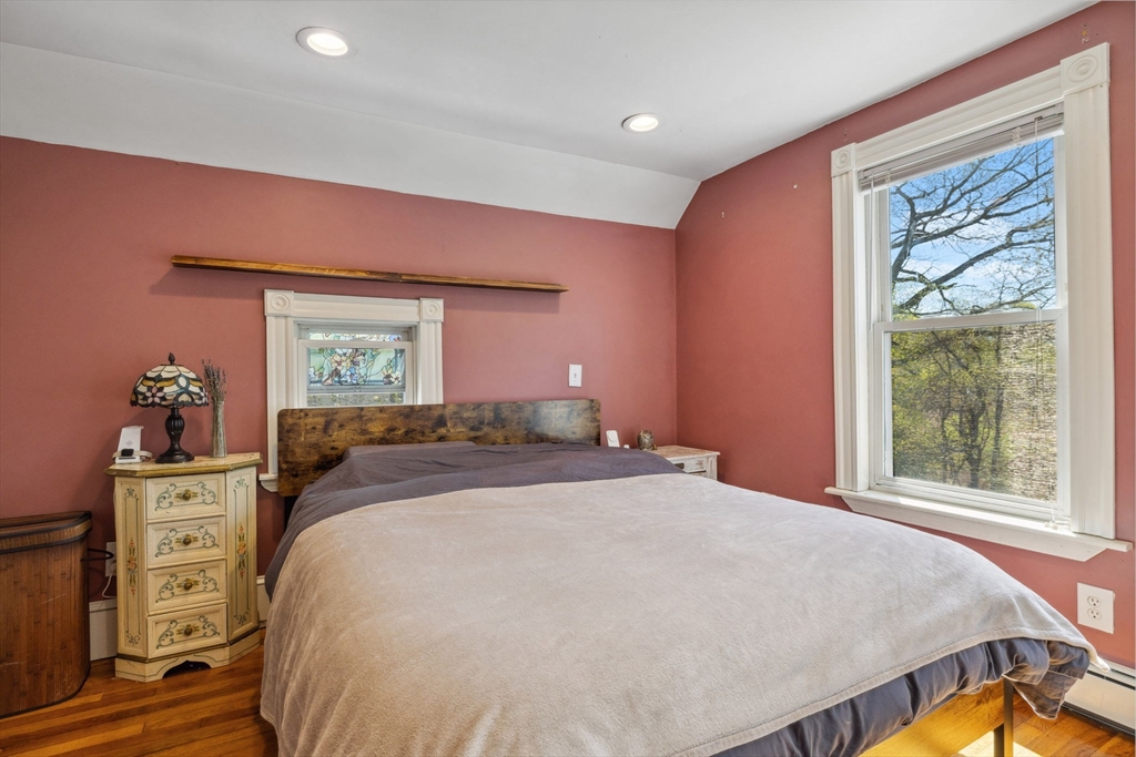 46 Appleton Street Saugus, MA 01906 - Photo 39 of 42 a bedroom with a bed and a dresser