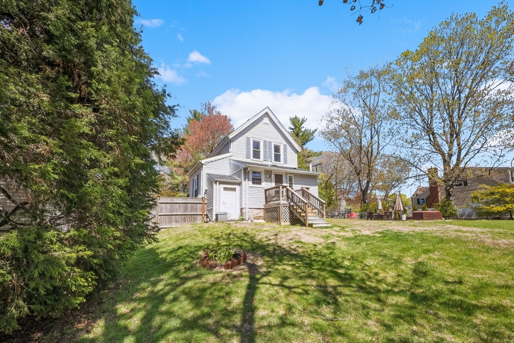 46 Appleton Street Saugus, MA 01906 - Photo 10 of 42 a house with huge green field in front of it