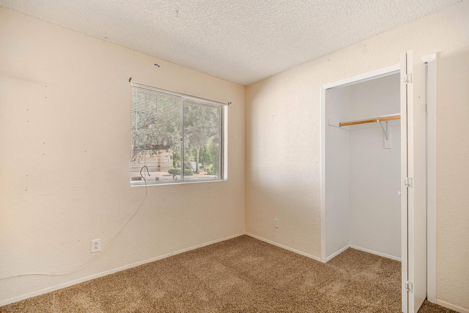 14626 North 38th Street Phoenix, AZ 85032 - Photo 4 of 13 an empty room with windows