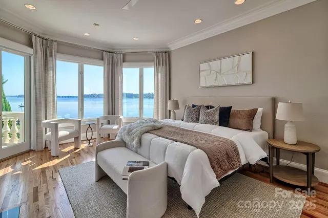 a spacious bedroom with a bed and a couch