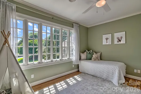 a bathroom with a toilet a sink and a mirror