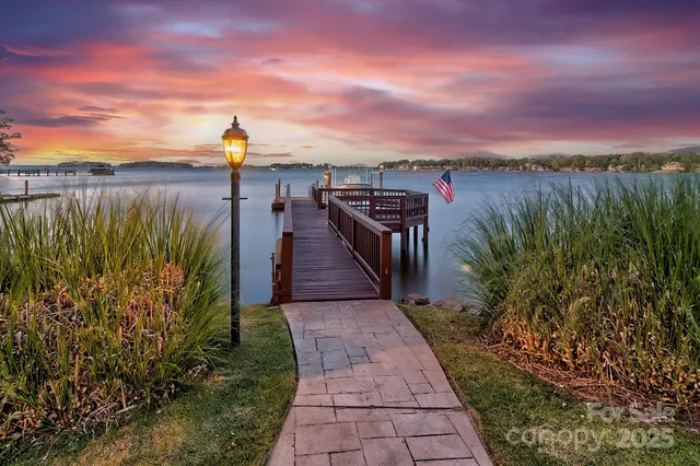 a view of a lake with a building in the background