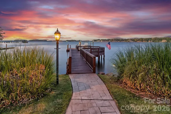 a view of a lake with a building in the background
