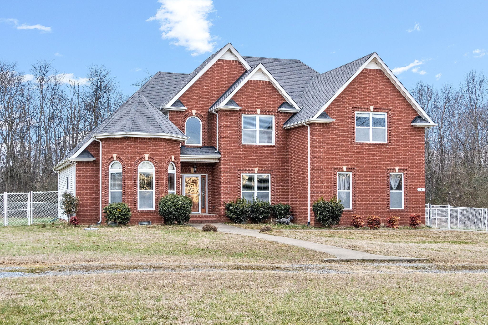 721 Needmore Road Clarksville, TN 37040 - Photo 1 of 40 a front view of a house with a yard
