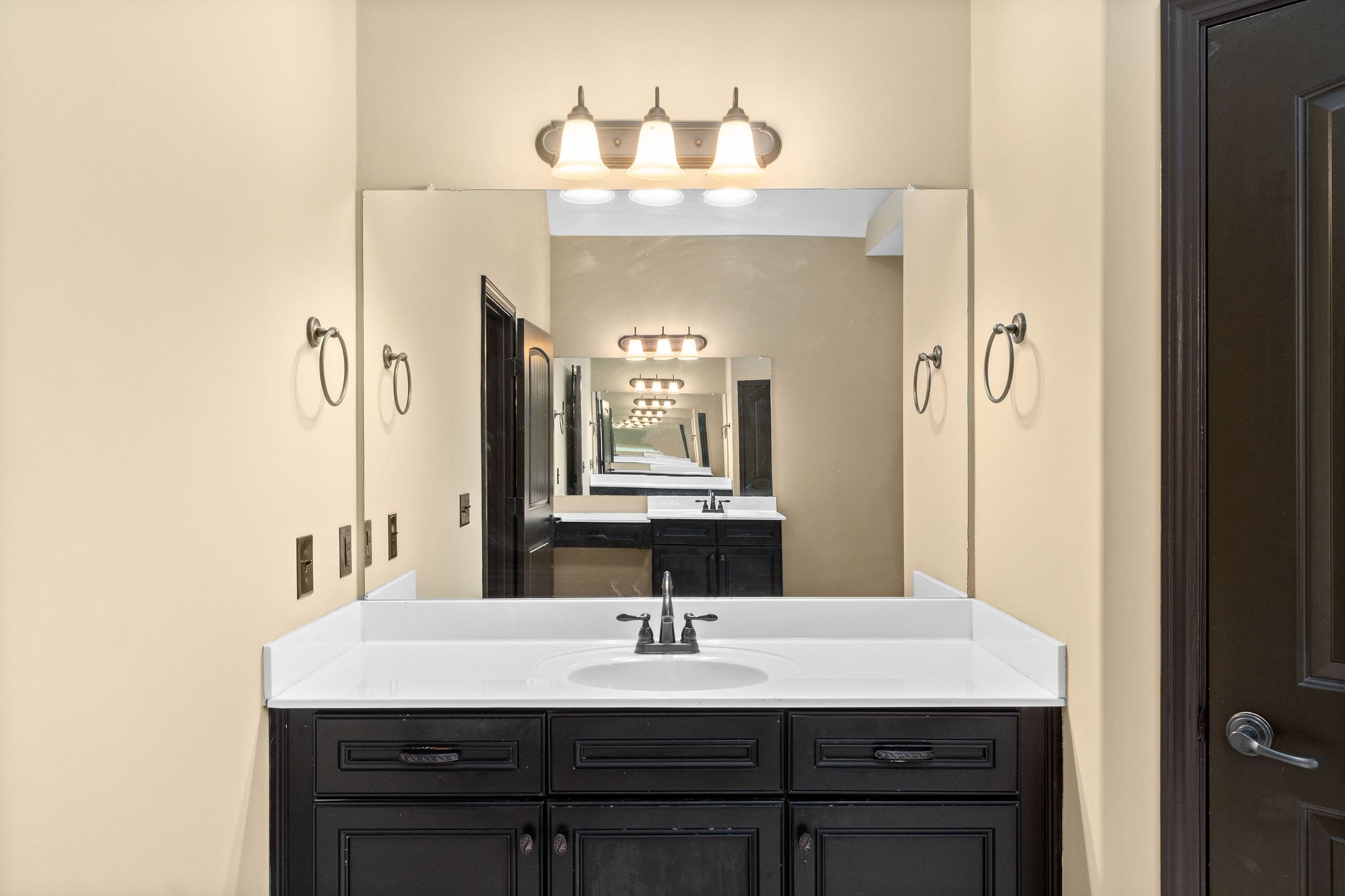 721 Needmore Road Clarksville, TN 37040 - Photo 21 of 40 a bathroom with a sink and a mirror