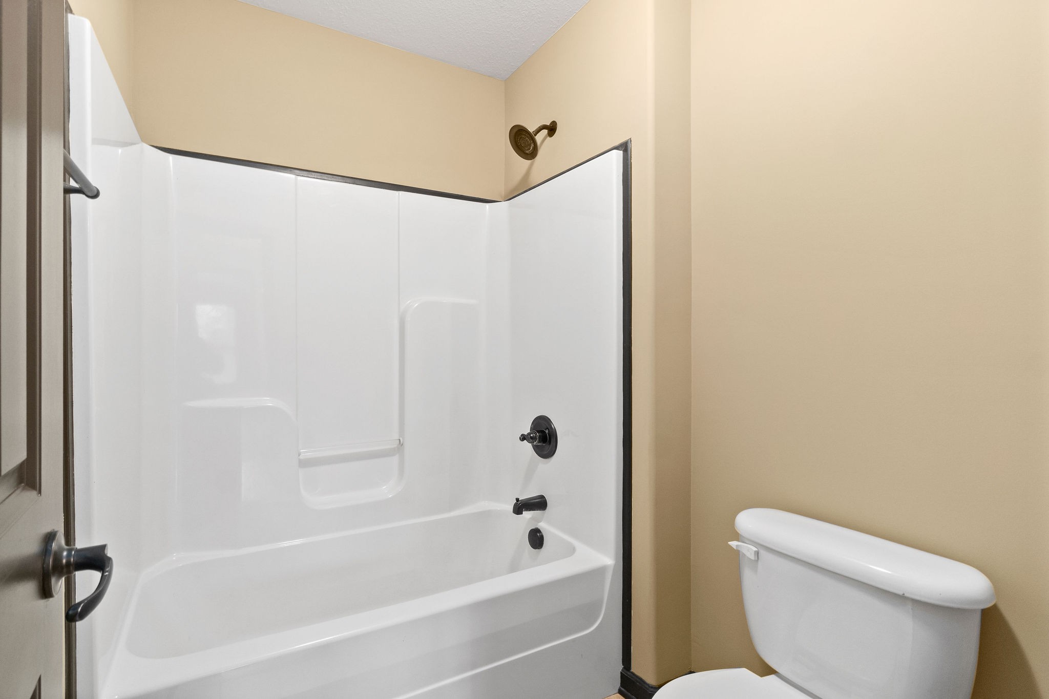 721 Needmore Road Clarksville, TN 37040 - Photo 29 of 40 a bathroom with a toilet and a bathtub
