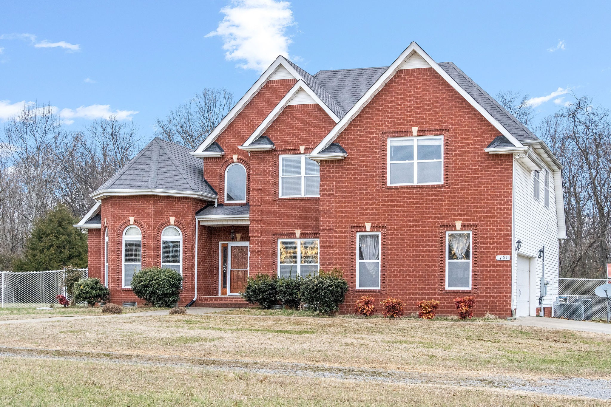721 Needmore Road Clarksville, TN 37040 - Photo 3 of 40 a front view of a house with yard