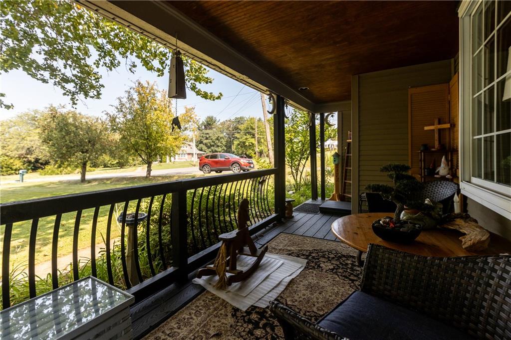 2172 Mercer Road New Brighton, PA 15066 - Photo 8 of 35 a balcony with chairs and a table