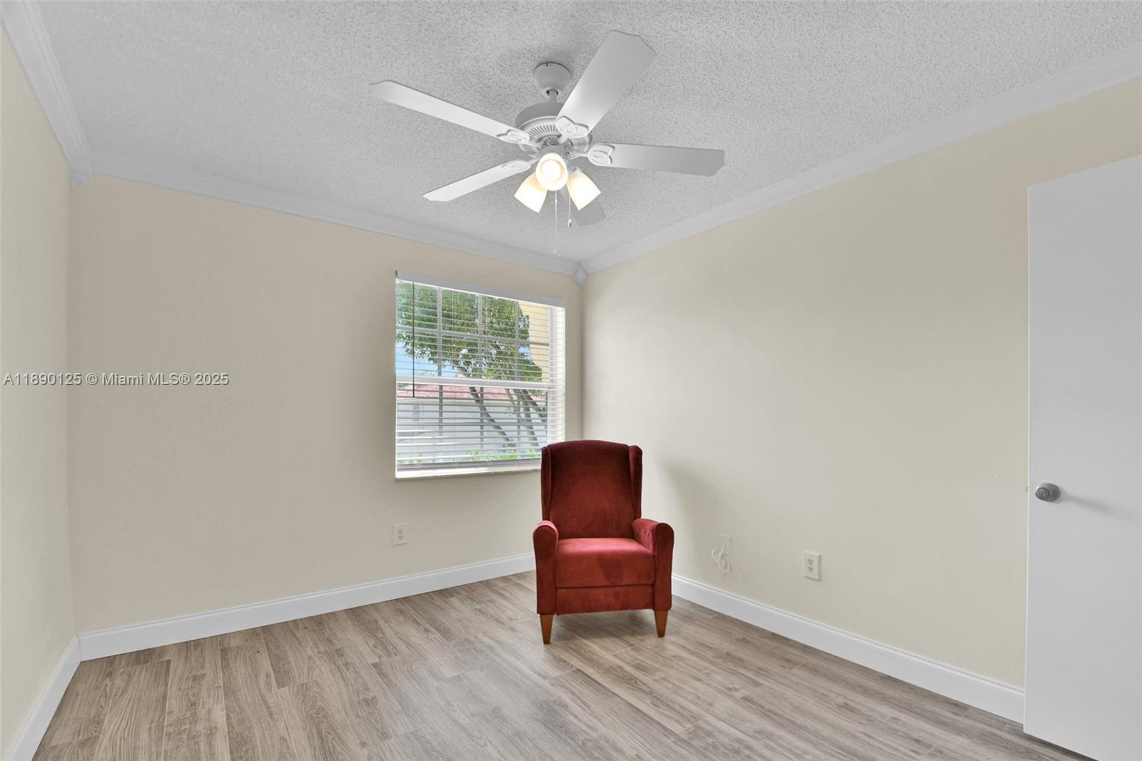 8713 Northwest 6th Court, Unit 8713 Coral Springs, FL 33071 - Photo 24 of 38 a room with furniture and a window