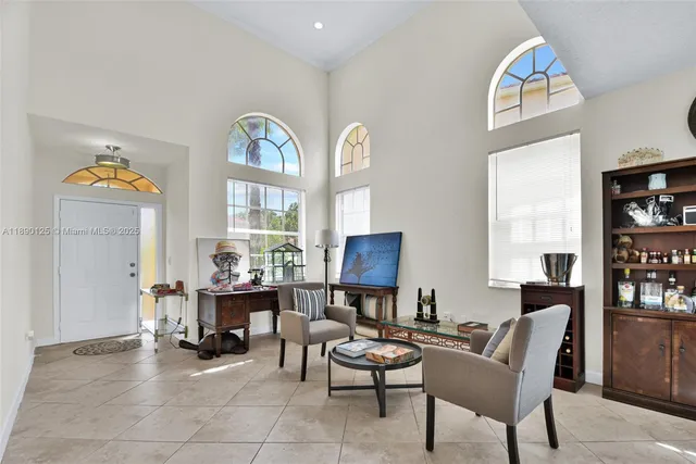a outdoor living space with furniture and a large window