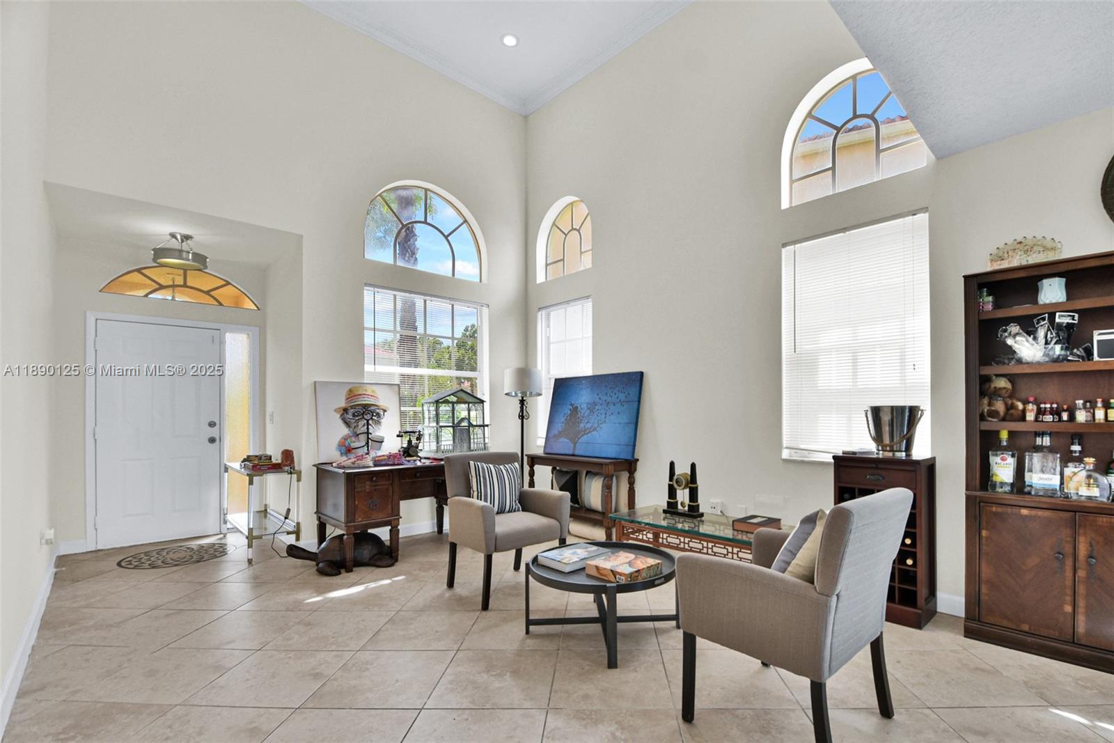 8713 Northwest 6th Court, Unit 8713 Coral Springs, FL 33071 - Photo 6 of 38 a outdoor living space with furniture and a large window