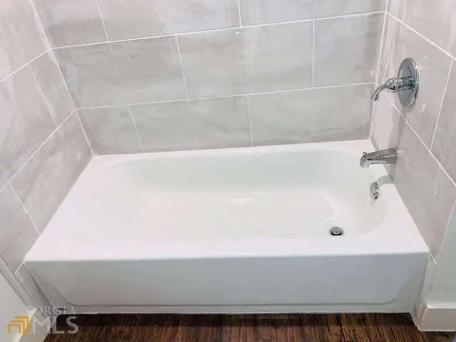 a bathroom with a bathtub