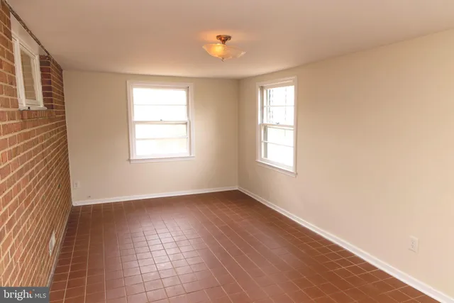 a bathroom with a sink a mirror and a shower