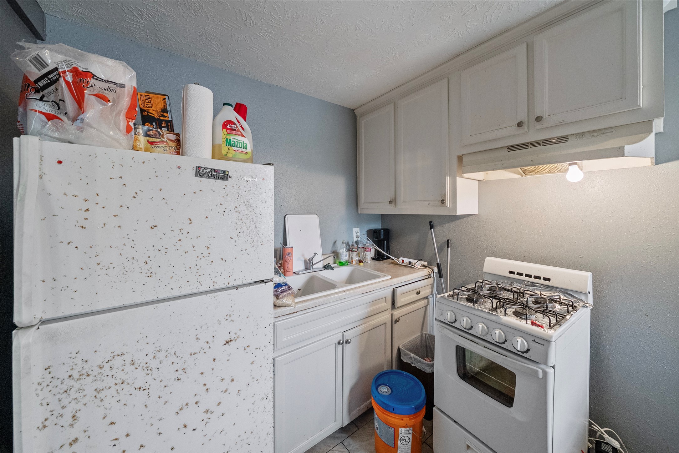 7938 Kerr Street, Unit 6 Houston, TX 77029 - Photo 13 of 18 a utility room with dryer and washer