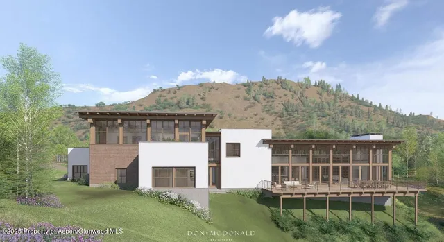 a view of house with yard and entertaining space