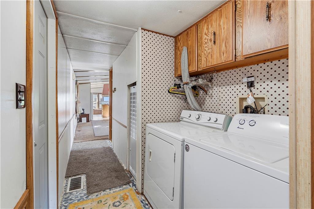 1300 Hidden Valley Road Bulger, PA 15019 - Photo 24 of 25 a view of washer and dryer with bathroom in the background
