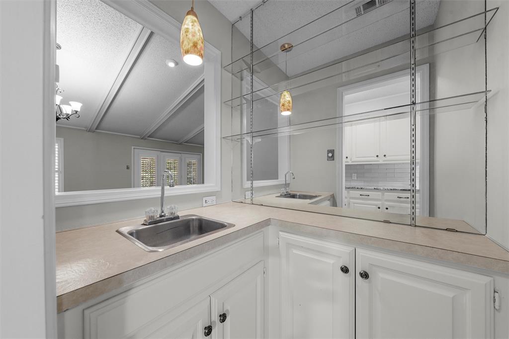 4108 Old Mill Road Waco, TX 76710 - Photo 11 of 40 a kitchen with a sink cabinets and window