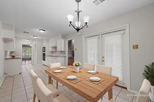 a view of a dining room with furniture