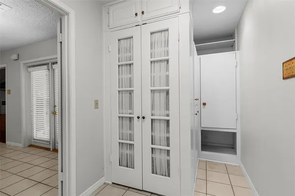 a view of a bathroom with a glass door